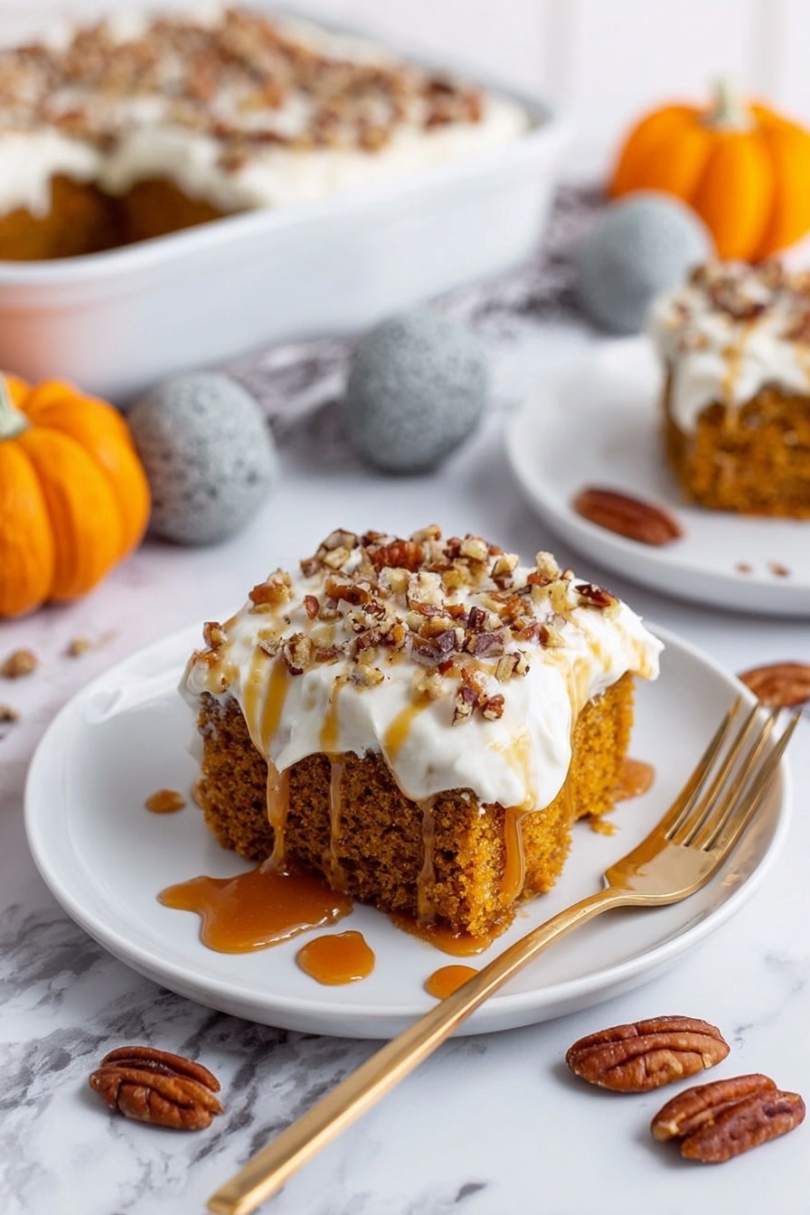 The image shows a square piece of soft, orange-brown cake on a white plate, placed on a white marbled surface. The cake has a thick layer of white cream frosting on top, sprinkled with chopped pecans. A shiny, amber caramel sauce is drizzled over the frosting and some of it runs down the sides, pooling slightly on the plate. Whole pecans are scattered around the cake on the plate. A gold fork lies next to the cake. In the background, there is a larger dish of the same cake with a white frosting border and pecan pieces, along with decorative small pumpkins and grey stones. Photo taken with an iphone --ar 2:3 --v 7